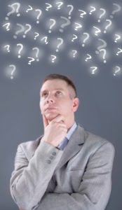 businessman thinking and question mark background