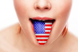 America tongue language open mouth. Studio shot.